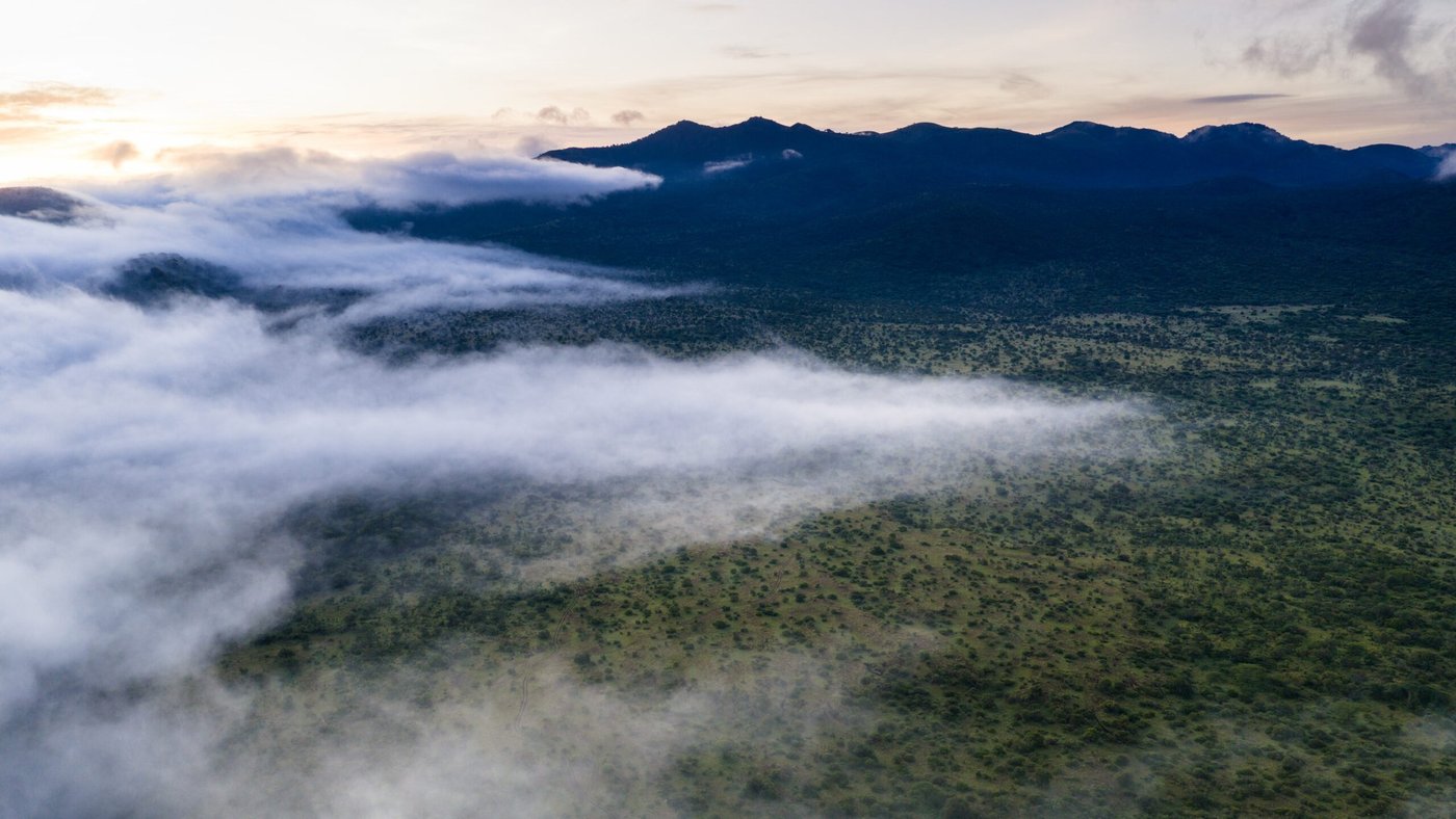 Cloud inversion filling the valley below the Chyulu Hills near ol Donyo Lodge