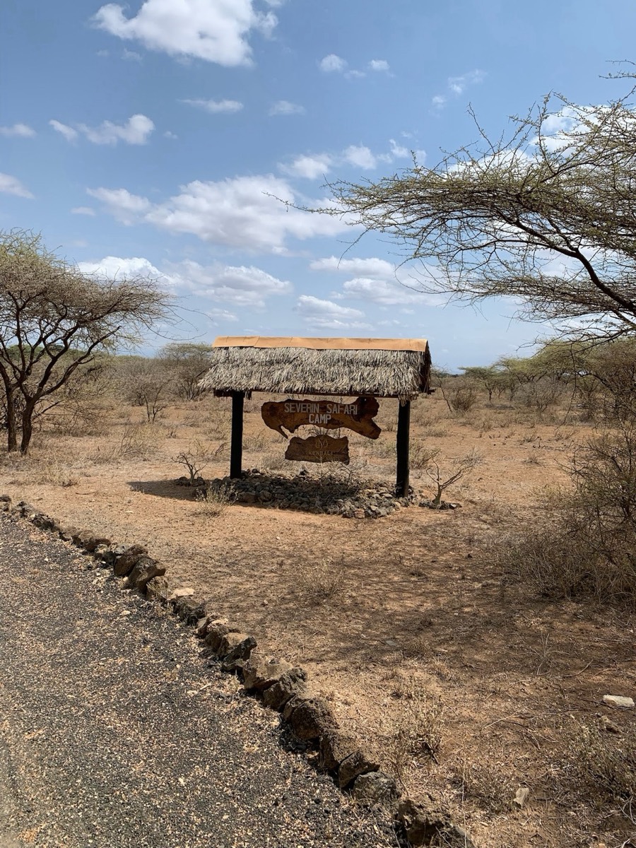 The sign at the turn-off. Because the camp lies inside the park, you pay Tsavo West entry fees to reach your bed, and again for every day you stay.